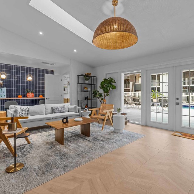 The Park at Murano - Clubhouse Lounge Area with Tables and Chairs